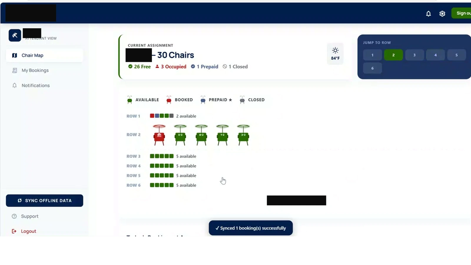 Beach chair map on test data after an offline booking synced: one chair booked in row 2, with the brand and location covered.